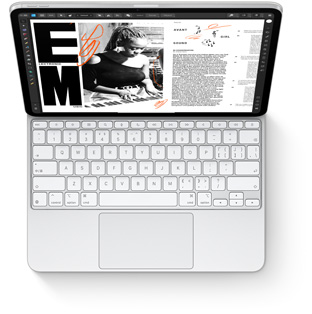 iPad Pro 与适用于 iPad Pro 的白色妙控键盘相连的俯视图。