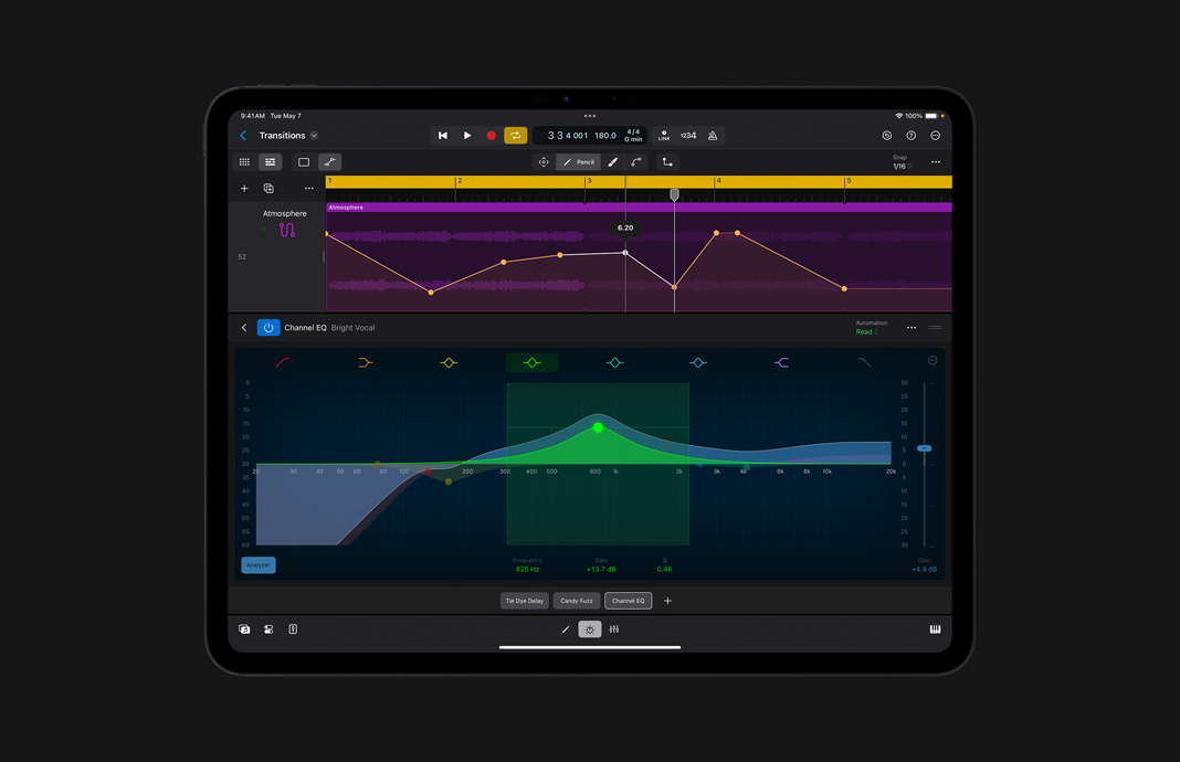 iPad Pro 特写视图展示 iPad 版 Logic Pro 的混音控制台上的通道条