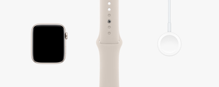 排成一行：Apple Watch SE、星光色运动型表带和磁力充电器转 USB-C 连接线的正面视图。