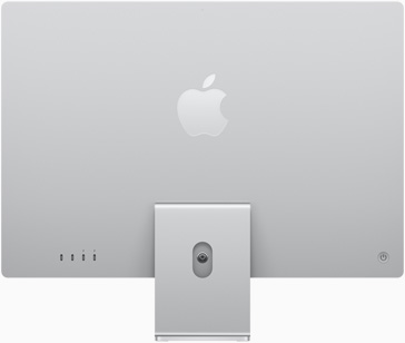 银色 iMac 立在底座上，Apple 标志位于背部居中的位置