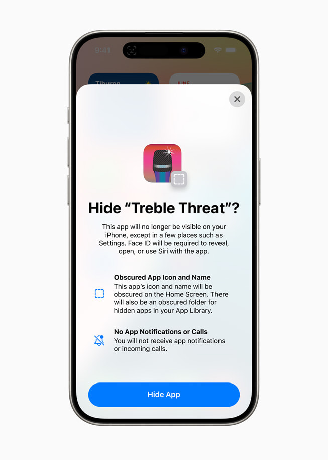 iPhone 15 Pro 上显示提示界面，询问用户是否希望隐藏一款名为 Treble Threat 的 app。