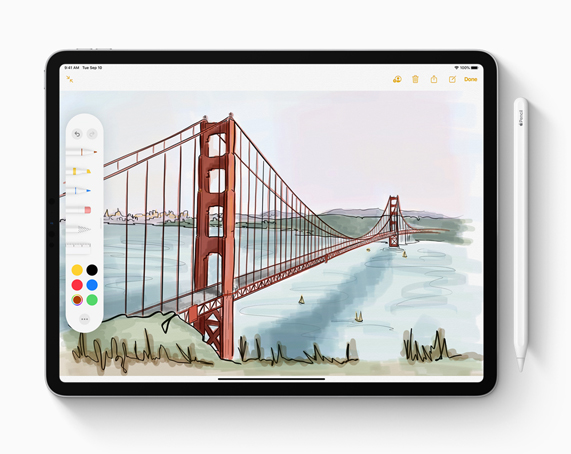 iPad 与 Apple Pencil。